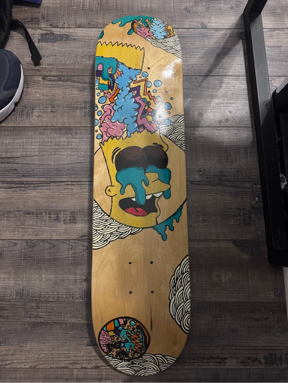 Graphic Skateboard Deck with Colorful Surreal Artwork - Picture 1 of 3